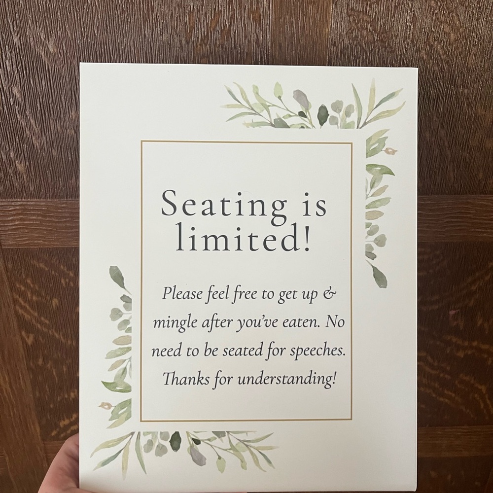 Elegant Seating Sign with Greenery